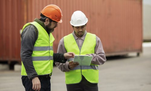 medium-shot-men-wearing-neon-vests